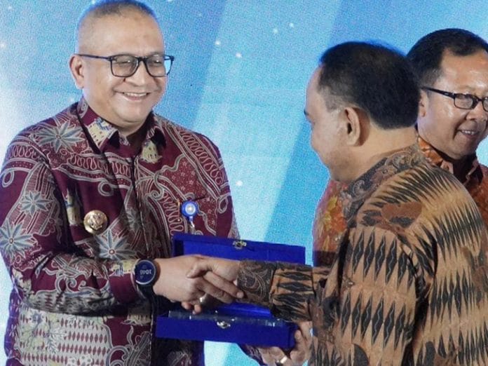 kota padang imdi