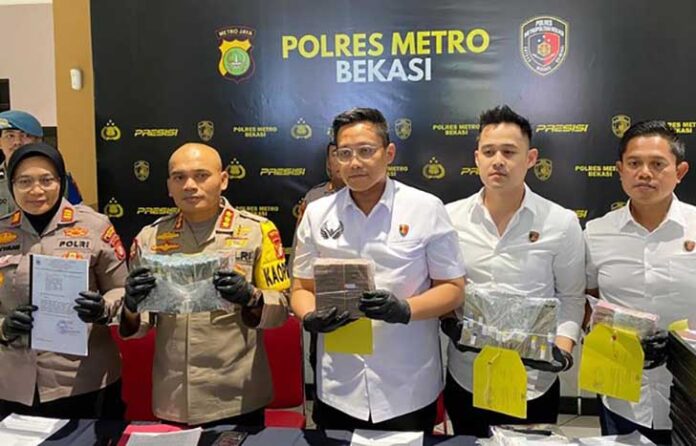 Kepolisian menetapkan dua tersangka berinisial KD dan NY dalam kasus dugaan korupsi dana hibah untuk atlet difabel di Kabupaten Bekasi, Jawa Barat. (Foto: Istimewa)